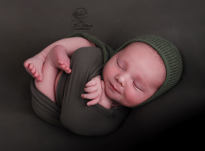 Brisbane newborn baby boy photographed wrapped up