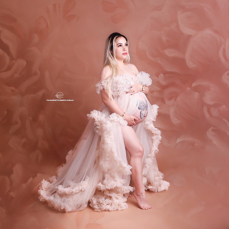 pregnancy photo shoot mama with designer's gown